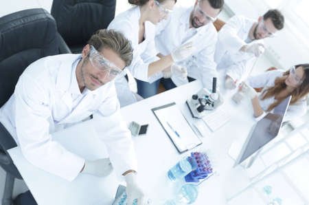 view from the top.modern young scientist sitting at workplaceの写真素材