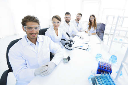 Male scientist and the team in the lab.の写真素材