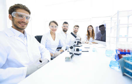 Male scientist and the team in the lab.の写真素材