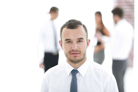 portrait of successful businessman on blurred backgroundの写真素材