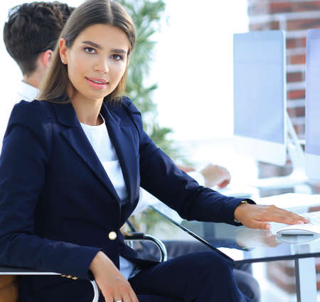 young business woman sitting at Desk
