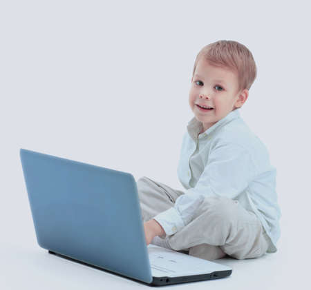 happy boy using the computerの写真素材