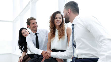 welcome handshake between two colleagues.の写真素材