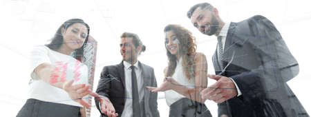 Executive woman talking with her business teamの写真素材