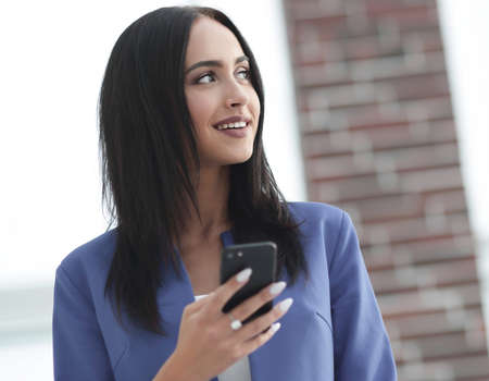 Portrait of a woman using a cell phone