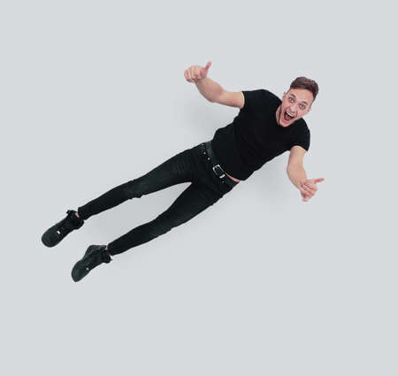 Man fly showing ok sign gestureの写真素材