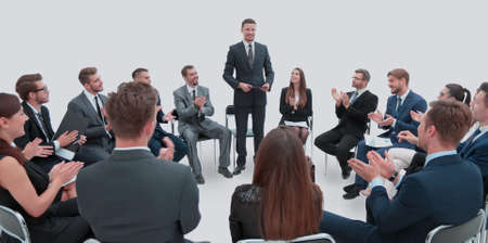 A speaker giving a talk on in a corporate Business Conference.の写真素材