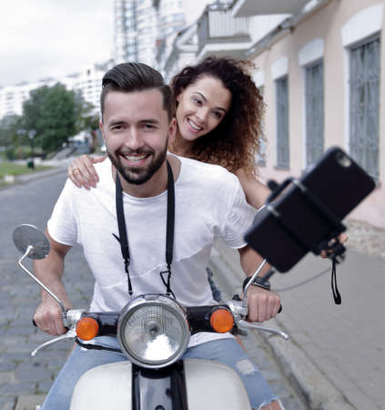 Happy couple traveling on motorcycle.Travel conceptの写真素材