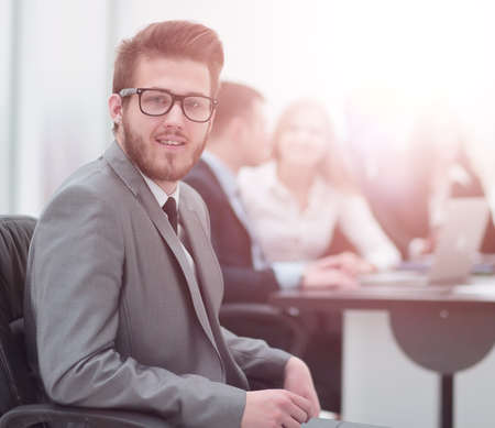 Face of  smart businessman on the background of business peopleの写真素材