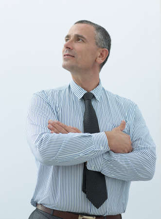 confident businessman looking into the futureの写真素材