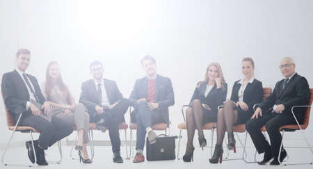 Speaker at a business meeting answering question from partiの写真素材