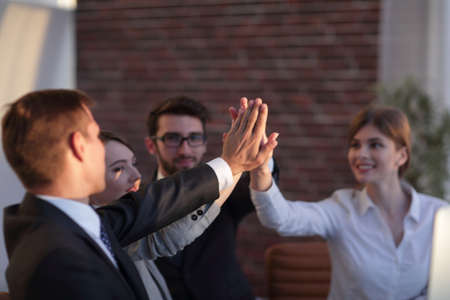 successful business team giving each other a high five