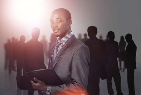 Afro-American businessman with his teamの写真素材