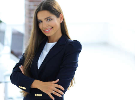 young business woman on the background of the officeの写真素材