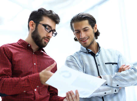 employees of the company, discussing documentの写真素材