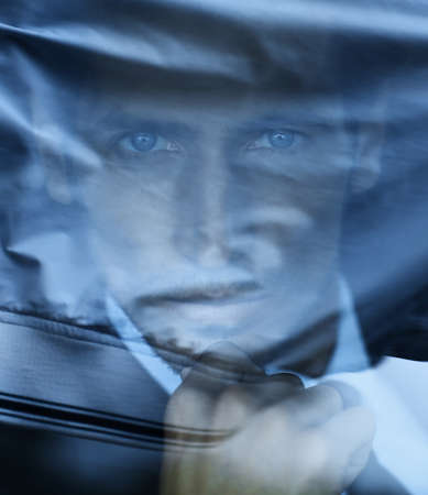 background image of the businessman in the carの写真素材