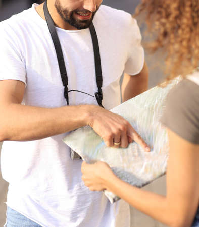 Couple of loving tourists enjoying city tourの写真素材