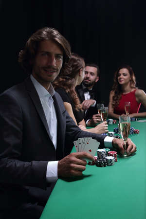 group of sinister poker playersの写真素材