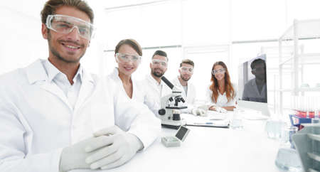 Male scientist and the team in the lab.の写真素材