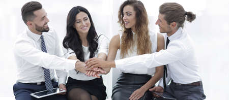 successful business team with hands clasped together