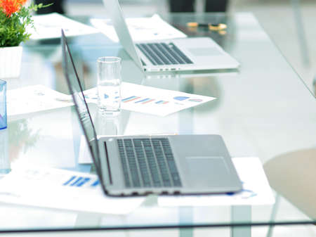 background image two laptops on the desktop.business background.の写真素材