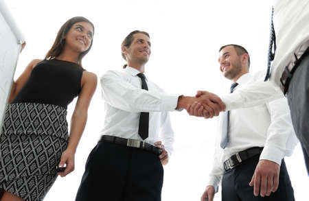 handshake business colleagues after discussing the new presentation.