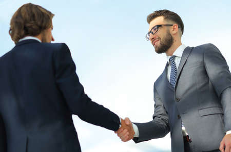 Business handshake and business people.の写真素材