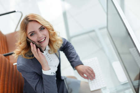 closeup. business woman talking on smartphone