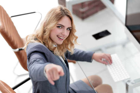 closeup.smiling business woman showing forwardの写真素材