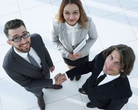 Business people shaking hands after good dealの写真素材