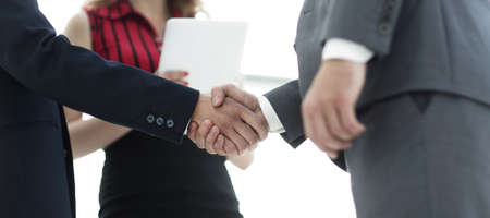 Businessmen handshaking after good deal. Business conceptの写真素材