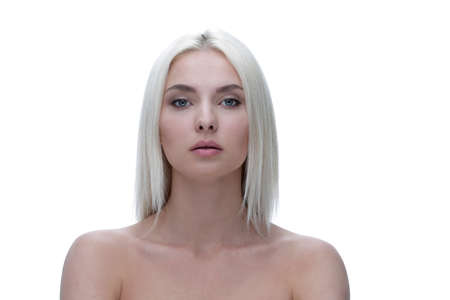 Face of a beautiful young woman with blond hair and everyday make-up.の写真素材