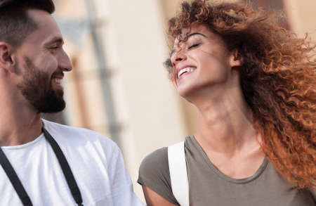 Happy smiling tourists walking  and enjoying the viewの写真素材