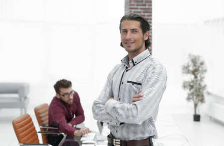 businessman standing in the spacious officeの写真素材