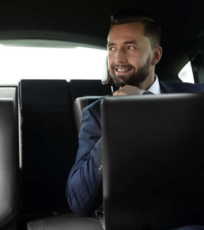 Business people use a laptop