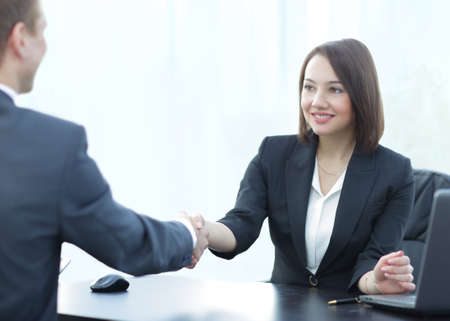 Negotiating business,Image business woman handshakeの写真素材