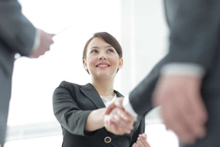 Business people  shaking hands to seal a dealの写真素材