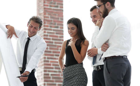 business team discussing new ideas,looking at the flip Charter .の写真素材