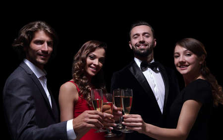 Cheerful people celebrating a sucess with Champagneの写真素材