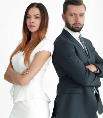 Portrait of business people back to back against white backgrounの写真素材