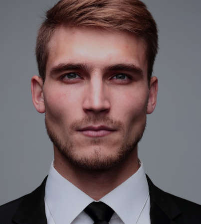 Close-up portrait of a successful handsome business man