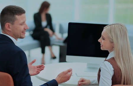 Business meeting at the table with computerの写真素材