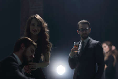 two glamorous couples, have fun in the casinoの写真素材