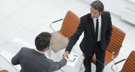 closeup. handshake financial partners