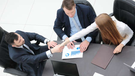 handshake business people after discussion of the contract