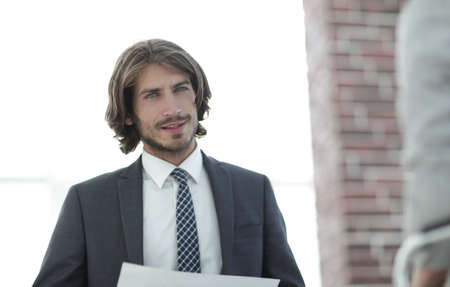 A relaxed conversation of a man and a woman in the officeの写真素材