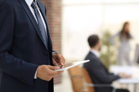 closeup.businessman working on tablet computer