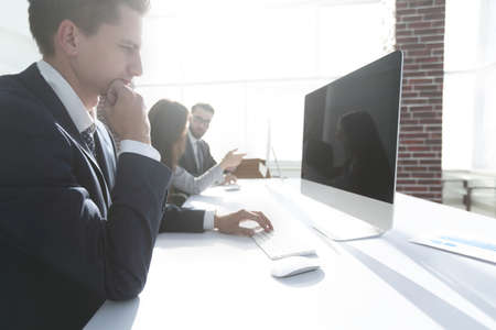 serious businessman working on computerの写真素材