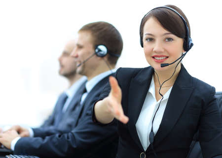 Manager of call center reaches out to shake hands.の写真素材