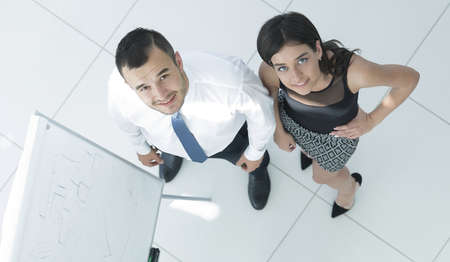 view from the top. business team standing in office hall